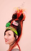 When I was a student at Avenue Five Institute in Austin, TX we had to create something out of hair. We chose to create an entire village out of our models hair, using extentions, hair color/hair spray, toy houses, horses, cows, tornado's. This was a fun project for us to show our creative side. 