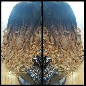 All hair by Kina Weave Specialist's photo