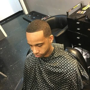 nas half moon haircut