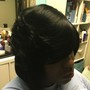 Relaxed hair ponytail with bangs