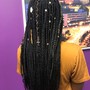 Shaved sides extended length braids