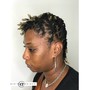 Hi Top Loc retwist- only the top mid section of hair is Loc’d with a nice portion of the back and sides SHAVED not taped.