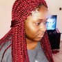 Natural hair braided with weave at the ends