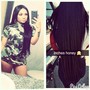 Women stitch braids w/ hair added