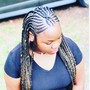 Natural hair braided with weave at the ends