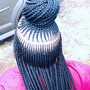 Natural hair braided with weave at the ends