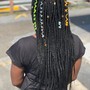 Skinny feed in Braids to the side