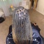 Medium  mid back knotless Braids