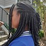 Braided feed in ponytail