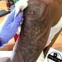 Realistic tattoo session