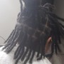 Retwist on Locs, Includes a shampoo.