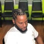 Dreadlock retwist (half head)