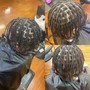 Kid's Braids half up/ down style individuals in the back