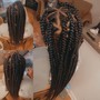 Short bohemian knotless braids