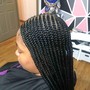 Medium  size cornrow ponytail