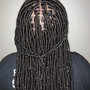 Waist length soft locs.