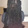 Waist length soft locs.