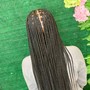 Medium knotless braids  butt length with curls