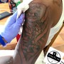 Realistic tattoo session