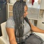 Med. Short knotless bohemian Box Braids