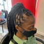 Braids on Retwisted Locs