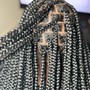 Medium tribal braids w/knotless (midback)