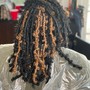 Dreadlocks retwist