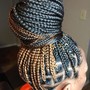 cornrows( Mohawk, straight back )