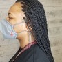 Mohawk micro braids. $160 extra for own hair