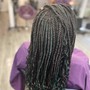 Waist length medium knotless braids