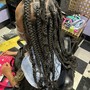 Coi Leray braids