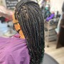 Waist length medium knotless braids