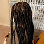 Waist length soft locs.