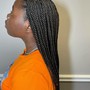 Small mid-back knotless plaits