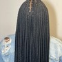 SMedium mid-back knotless plaits