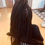 Half Box Braids on shaved head