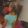 Kid's Braids half up/ down style individuals in the back