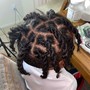 Loc Re-twist (top of head shaved sides)