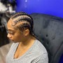 Cornrows with added hair and design