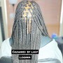 Medium lower back knotless Braids