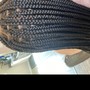 Tribal braids, two layer, French braids at the top Box Braids in the back