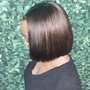 Sleek low mid or High ponytail