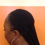 Cornrows. Ponytail medium size mid back.