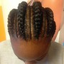 Cornrows. Ponytail medium size mid back.