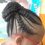 Two cornrows into a bun, or hanging.