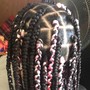 Feed In Braids (price varies depending on style)