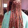 Two Strand Twist (no locs) Shoulder length, full head.