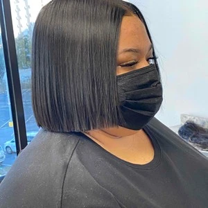 Image of Blunt cut weave with perm