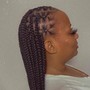 Feed in braids in front and weave in back