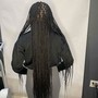 Braided half up back weave